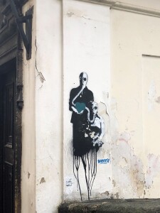 Banksy på en vegg i Praha